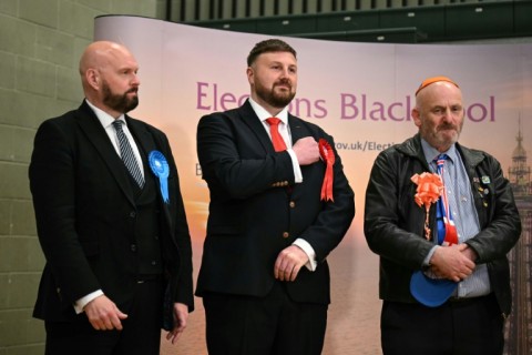 New Labour Party MP for Blackpool South, Chris Webb (C), reacts as his win is announced