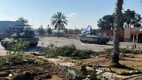 An Israeli army picture shows what it says are tanks from its 401st Brigade entering the Palestinian side of the Rafah border crossing with Egypt