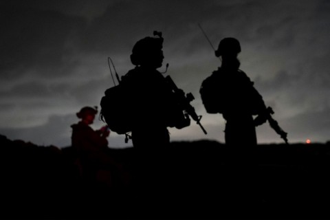 An Israeli army-released photo shows Israeli soldiers dismantling what it describes as a tunnel in the area of Beit Hanun in the northern Gaza Strip