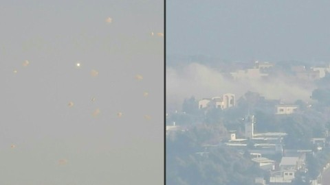 Israel intercepts Hezbollah rockets, smoke rises in Lebanese village after strike