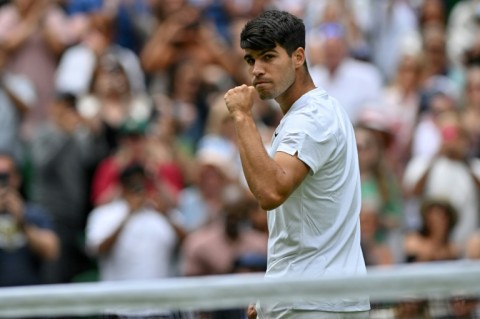 Champion: Carlos Alcaraz celebrates winning against Mark Lajal in the first round 
