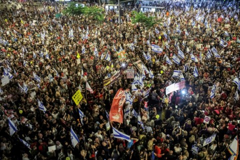 Israeli anti-government protesters in Tel Aviv on July 6, 2024 during a demonstration demanding action to release the hostages taken captive by Palestinian militants in the Gaza Strip in the October 7 attacks