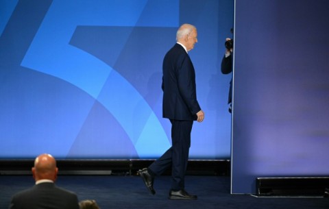 US President Joe Biden leaves after speaking at a press conference at the close of the NATO summit in Washington