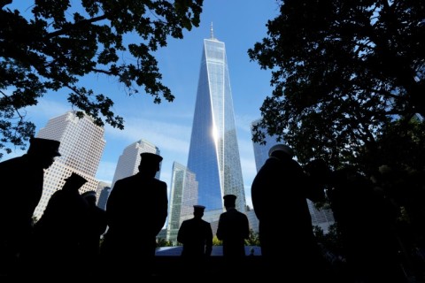 People look at the names of victims on the South Tower Memorial Pool during  during the 23rd anniversary of the September 11 terror attack on the World Trade Center at Ground Zero, in New York City on September 11, 2024.