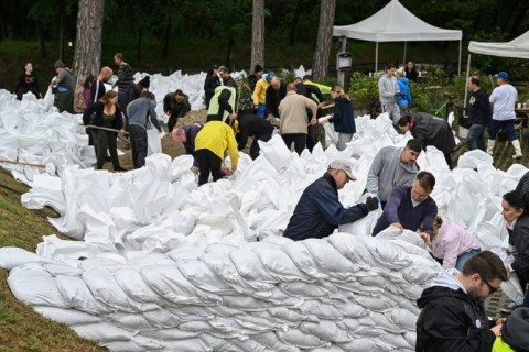 Experts say climate change is increasing the frequency and intensity of extreme weather events such as torrential rains and floods
