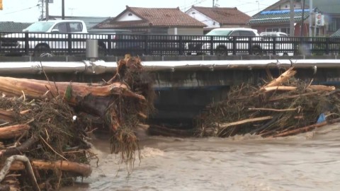 Floods, landslides hit central Japan months after major quake