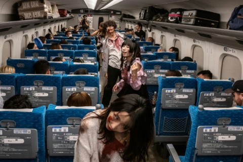 On board one chartered car of the bullet train were around 40 thrill-seekers ready to brave an encounter with the living dead between Tokyo and Osaka