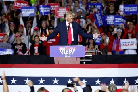 Violent rhetoric from Donald Trump, seen here at a rally in Milwaukee, Wisconsin, is escalating as the 2024 US election reaches a climax