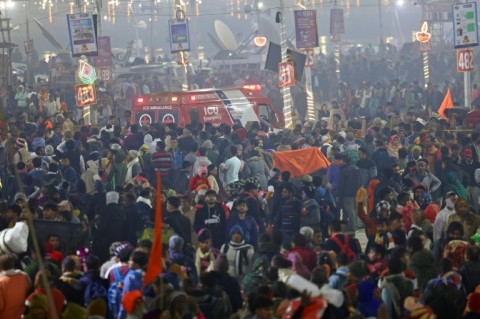 Officials were strolling the festival with loudhailers pleading with pilgrims to keep away from the disaster site