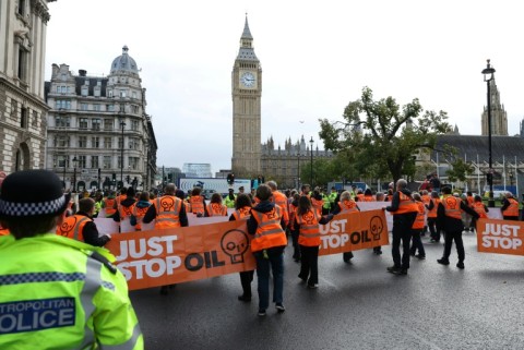 A Just Stop Oil slow march to disrupt traffic in Parliament Square in London in October 2023
