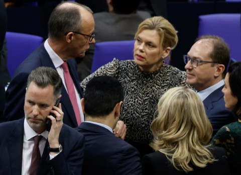 CDU leader Friedrich Merz, top left, with political allies in the German parliament 