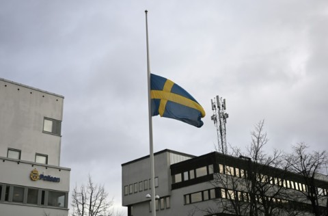 Swedish flags flew at half-mast on public buildings across the country one day after 10 people were killed in a mass shooting in Orebro