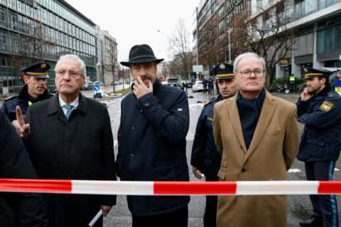 'We must show determination that something will change in Germany,' said Soeder (centre), who visited the scene 