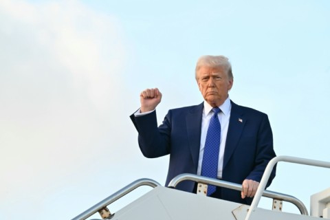 Germany's Chancellor Olaf Scholz (R) said he was 'a little irritated' by suggestions of sending troops