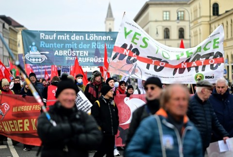 Anti-war demonstrators gathered outside the conference in Munich
