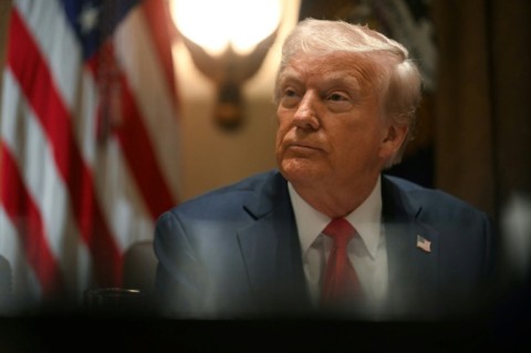 US President Donald Trump speaks during a cabinet meeting at the White House in Washington, DC, on February 26, 2025.