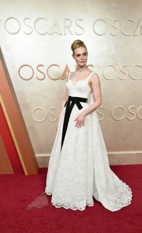 US actress Elle Fanning ("A Complete Unknown") wore white Givenchy to the Oscars 