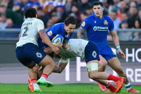 Italy's Ange Capuozzo (2nd L)