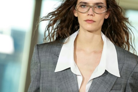 Stella McCartney presented an office-themed show... capped off with a pole dance