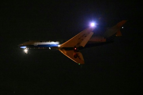 A plane carrying former Philippine president Rodrigo Duterte lands at an airport in Dubai on Wednesday