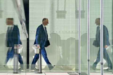 Germany is tearing up decades of precedent by backing a defence spending 'bazooka' pushed by leader-in-waiting Friedrich Merz