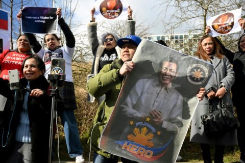 Protestors demonstrate in support of former Philippines president Rodrigo Duterte in front of the International Criminal Court