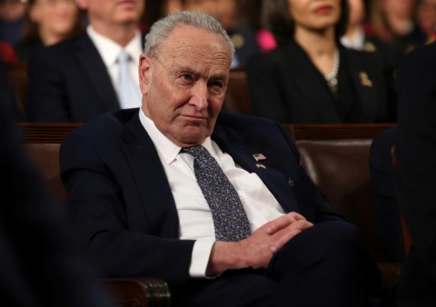 US Senate Minority Leader Chuck Schumer broke with most of his Democratic Party and voted to pass the Republicans' Trump-backed budget proposal that slashes federal spending