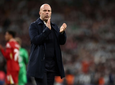 Arne Slot applauds fans after Liverpool's League Cup final defeat by Newcastle