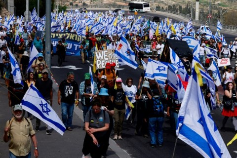 Israeli demonstrators march into Jerusalem demanding an end to the Gaza war.