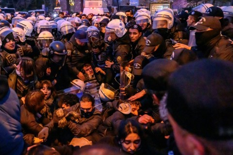Scuffles broke out between riot police officers and student protesters in Istanbul on Thursday evening