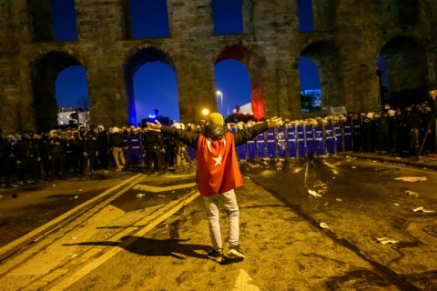 Riot police have fought running battles with protesters since Thursday night