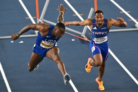 USA's Grant Holloway (L) and France's Wilhem Belocian battled in the men's 60m hurdles final