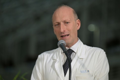 Before leaving hospital, the visibly frail pope waved to well-wishers