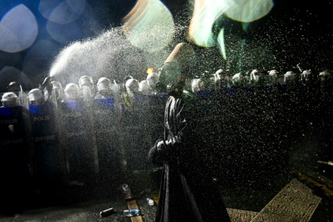 Riot police cracked down on protesters outside Istanbul City Hall and roughly dispersed a student sit-in on Galata Bridge