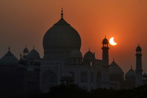 A partial solar eclipse behind the Taj Mahal in 2022