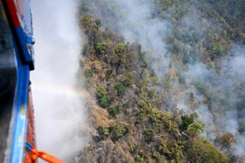 Levels of PM2.5 pollutants -- dangerous cancer-causing microparticles small enough to enter the bloodstream through the lungs -- were almost 15 times the World Health Organization's recommended limit in Chiang Mai on Thursday