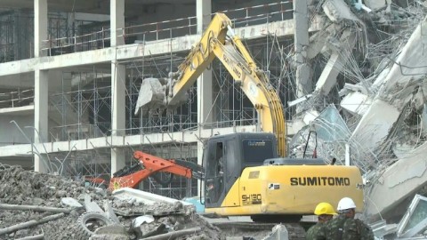 Rescuers search for survivors at Bangkok collapsed building site