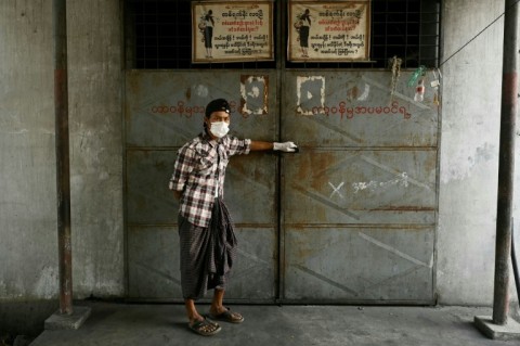 A worker is seen at the crematorium outside of Mandalay, where ambulances have been bringing the remains of the dead killed in Myanmar's massive earthquake