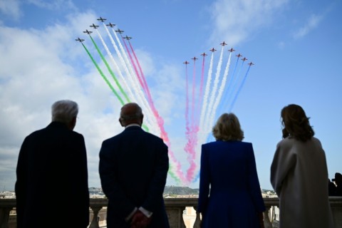 King Charles and Queen Camilla watched a ceremonial flypast by Italy's 'Frecce Tricolori' air force aerobatic team and Britain's 'Red Arrows'
