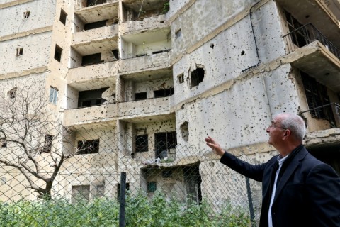 Many old buildings are still riddled with bullet holes