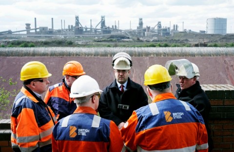 British Steel staff members gather at the plant as they take over its running from the Chinese owners Jingye