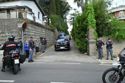 Vehicles escorted by Italian police enter the Omani embassy in Rome