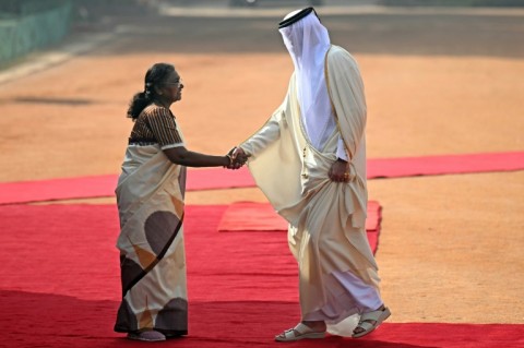 Indian President Droupadi Murmu (L)