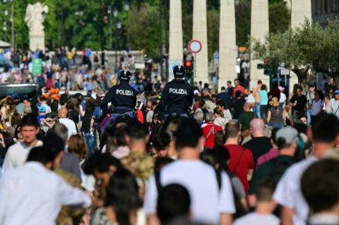 Crowds in a Rome street near the Vatican, a day after Pope Francis's death