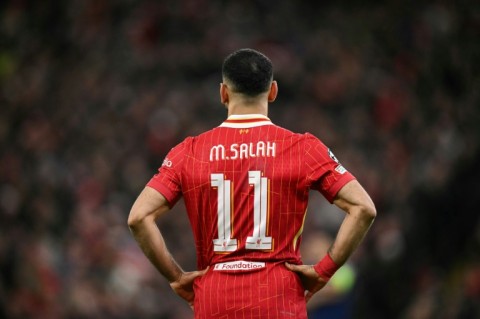 Liverpool midfielder Alexis Mac Allister celebrates his goal against Tottenham at Anfield