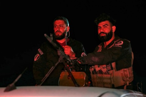 Syrian security forces at a checkpoint in Jaramana near Damascus early on May 2