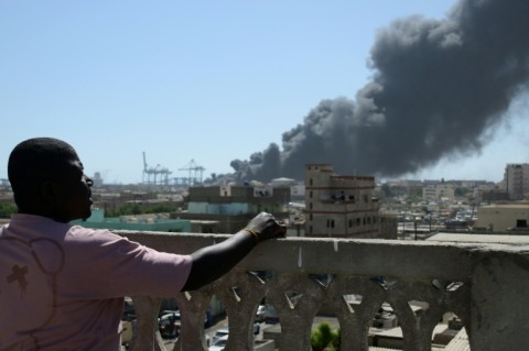 Smoke billows after a drone strike on the port of Port Sudan on May 6, 2025