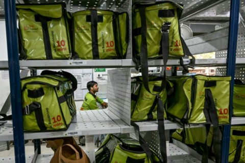 At a warehouse managed by online grocer BigBasket in central Mumbai, employees work with military-like precision to pull off deliveries in just 10 minutes
