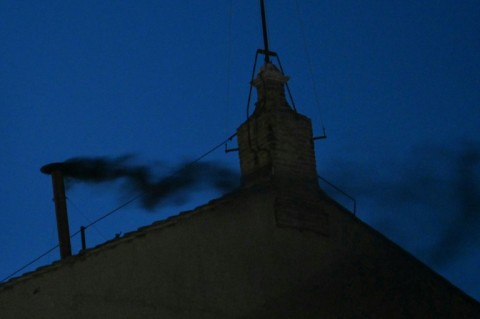 Black smoke billowed from a chimney above the Sistine Chapel after the first day of conclave