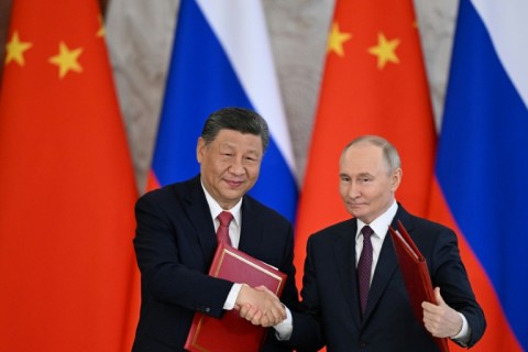 Xi said earlier that Beijing's ties with Moscow brought "positive energy" to a world in turmoil